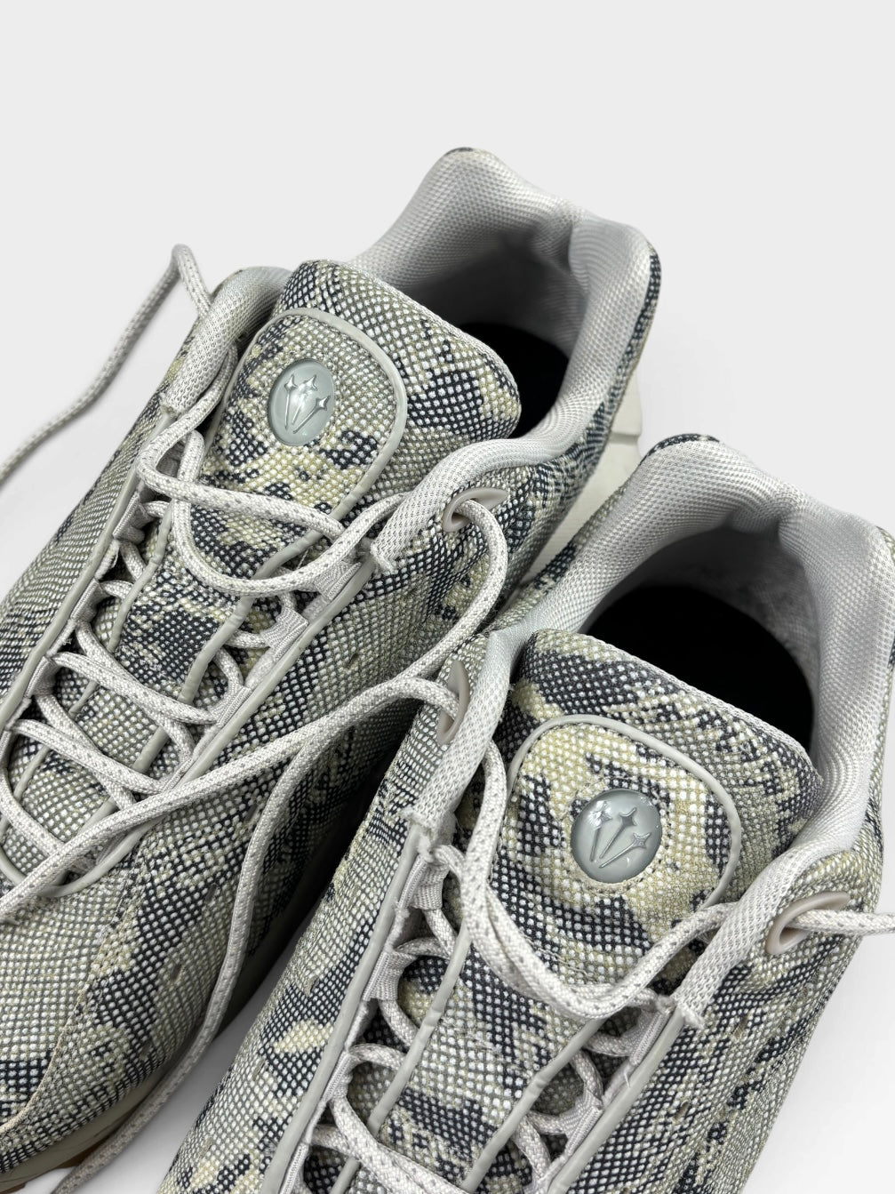 NIKE X NOCTA LOW TRAINERS